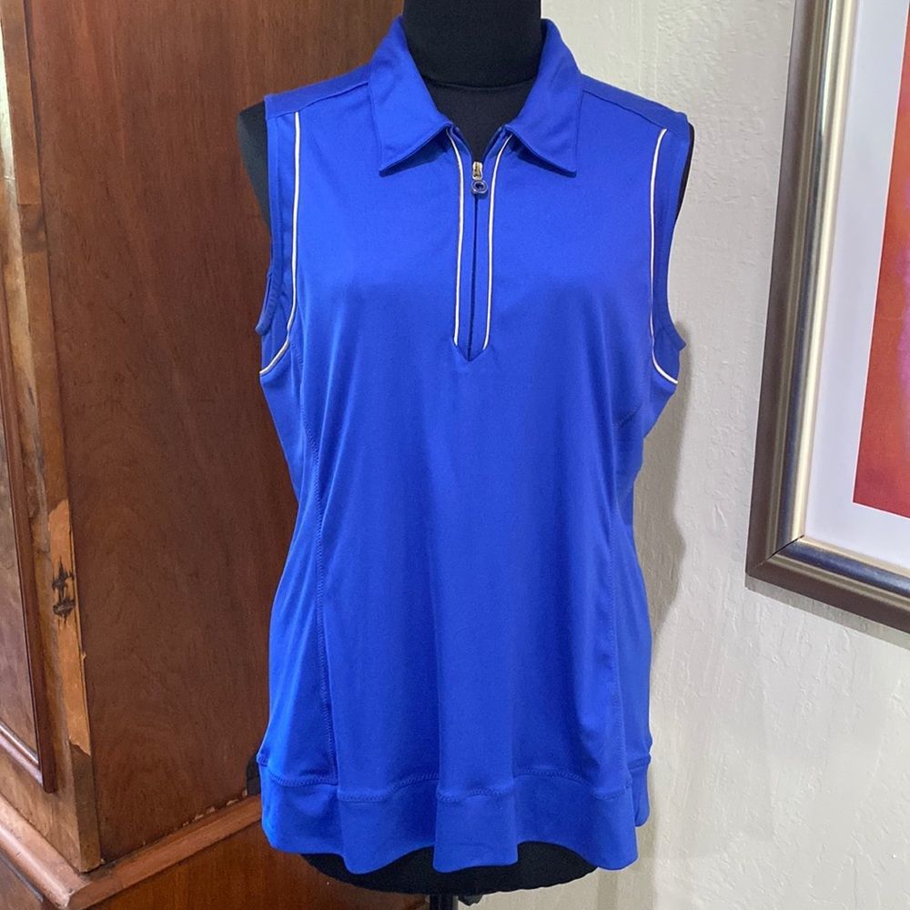 NWOT women’s golf top.